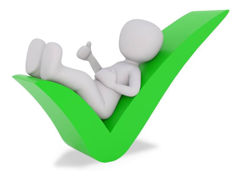 K800_man leaning on check mark