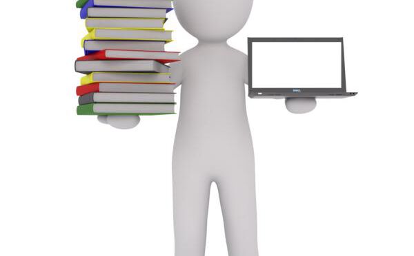 K800_man holding books and laptop